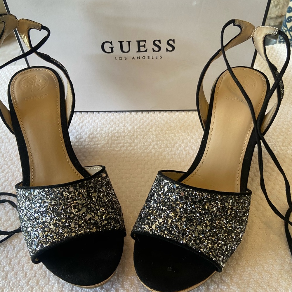 Never worn GUESS strappy, bling wedges. Size 8.5